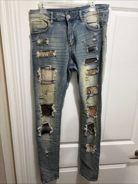 Embellish Men’s Relaxed Distressed Light Blue Patchwork Jeans